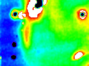 ORNL’s Ralph Dinwiddie uses infrared cameras to create heat maps of working materials that reveal their thermal properties and subsurface structure. This 1998 image of an aging aircraft’s engine cowling revealed severe subsurface corrosion. 