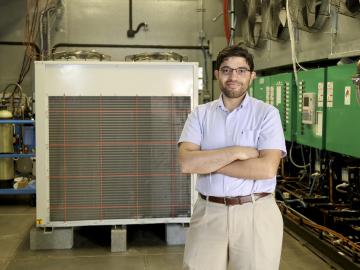 Omar Abdelaziz in ORNL’s Maximum Building Energy Efficiency Research Laboratory (MAXLAB). Photo credit: Jason Richards Omar Abdelaziz in ORNL’s Maximum Building Energy Efficiency Research Laboratory (MAXLAB). Photo credit: Jason Richards