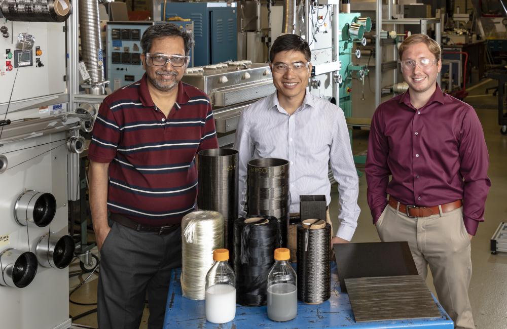From left, Amit Naskar, Ngoc Nguyen and Christopher Bowland in ORNL’s Carbon and Composites Group bring a new capability—structural health monitoring— to strong, lightweight materials promising for transportation applications. 