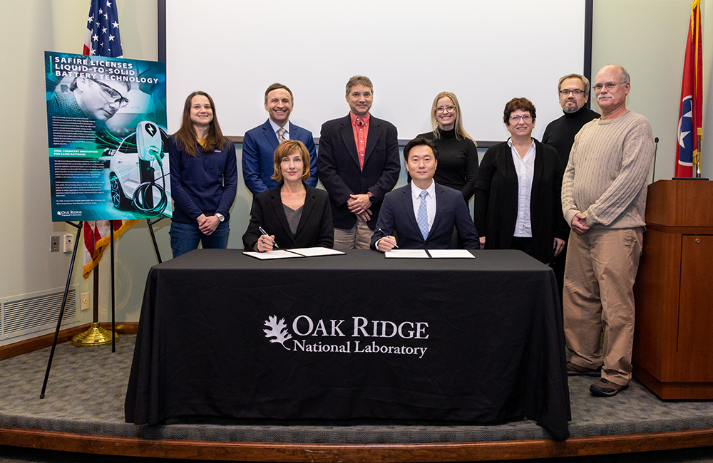 ORNL inventors and Safire Technology Group leadership attended a licensing event at the lab on Nov. 15. Standing, from left to right, are Katie Browning, Mike Grubbs, Gabriel Veith, Hayley Kleciak, Beth Armstrong, Sergiy Kalnaus and Kevin Cooley. Seated are Susan Hubbard and John Lee. Credit: Genevieve Martin/ORNL, U.S. Dept. of Energy