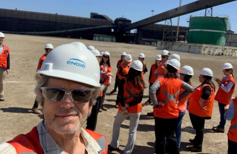 Keith Kline with Net Zero World delegation visiting a former coal power plant in Chile.