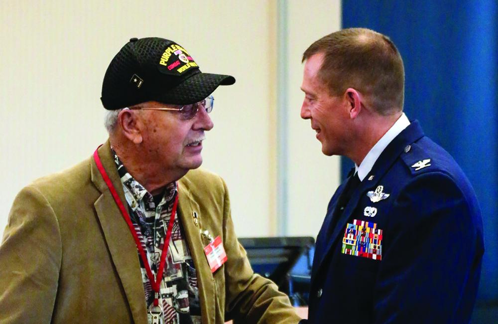 Col. Lee  Hartley (right) with ORNL retiree and World War II veteran Ernest Shepherd. (ORNL photo by Rachel Brooks) 