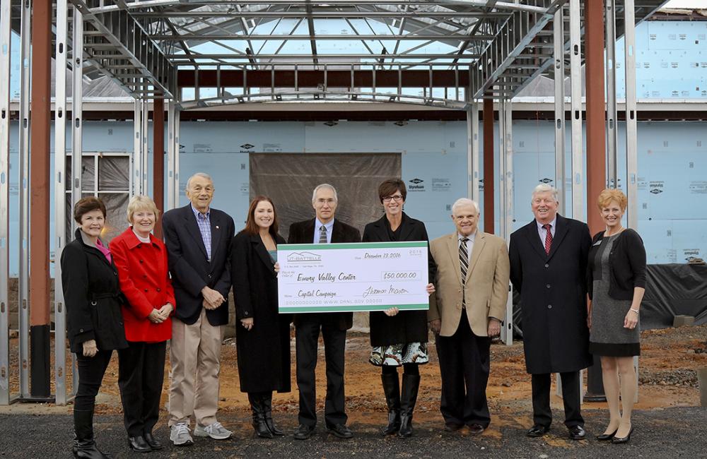 On hand for UT-Battelle's check presentation at the new facility construction site.