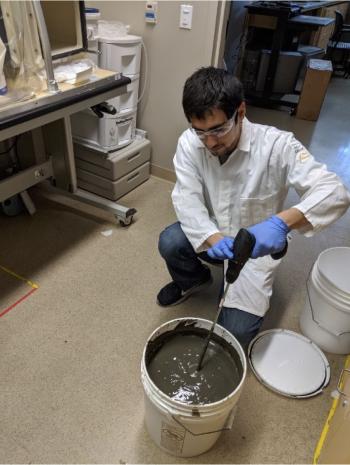 Undergraduate student Jesus Mercado homogenized reservoir sediments in the O’Day lab at UC Merced. Credit: UC Merced