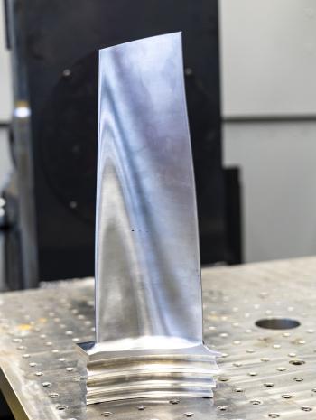 Contoured steam turbine blades require a very precise shape, with contoured curves that narrow toward the tip. Wire arc 3D printing had not previously been used to make a rotating component of this scale. Credit: Carlos Jones/ORNL, U.S. Dept. of Energy